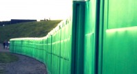 row of outhouse toilets