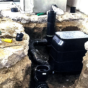 waterproofing and flood prevention devices in the basement of a toronto home