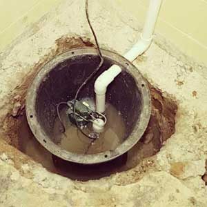 sump pump in toronto basement in need of repair