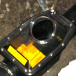 backwater valve installed in the basement of a toronto home before the ground has been back-filled and fixed